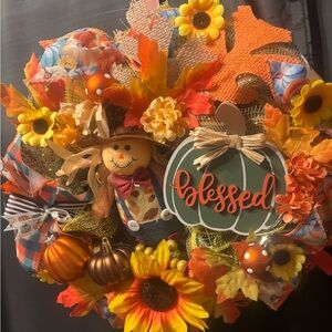 Festive Autumn Wreath with Sunflowers and Scarecrow